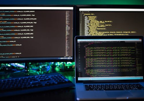 three-computer-screens-with-computer-programming-c-2023-11-27-04-58-32-utc (1) (1)